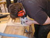 Me routing the baffle, to give the outer 35mm of the cone 10mm travel space.